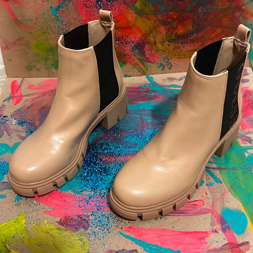 Guess mid top boots size 7M worn once
